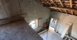 For sale a house to be finished in the center of Andagna