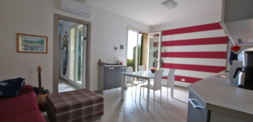 A modern apartment next to the village