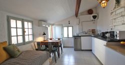 En mysig lägenhet med rymlig takterrass i La Pigna