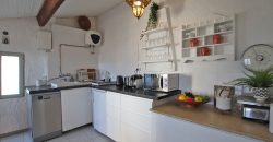 En mysig lägenhet med rymlig takterrass i La Pigna