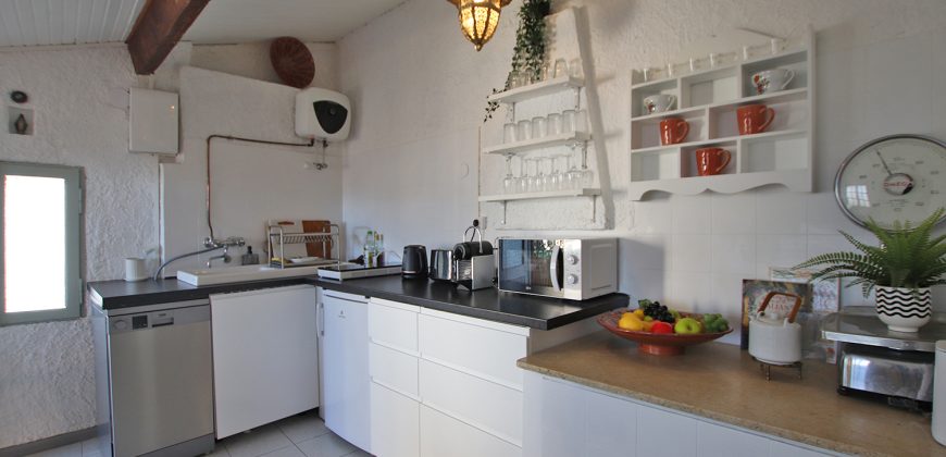 En mysig lägenhet med rymlig takterrass i La Pigna