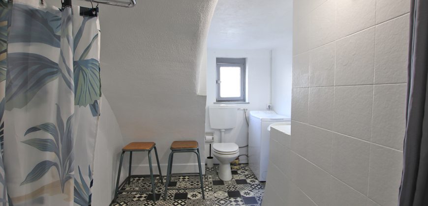 En mysig lägenhet med rymlig takterrass i La Pigna