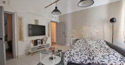 En mysig lägenhet med rymlig takterrass i La Pigna