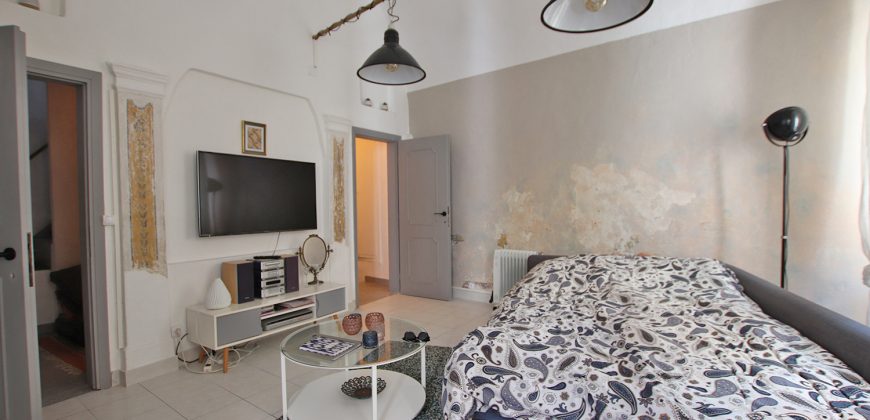 En mysig lägenhet med rymlig takterrass i La Pigna