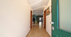 State-of-the-art apartment in a semi-detached villa