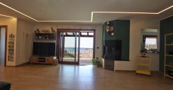 State-of-the-art apartment in a semi-detached villa