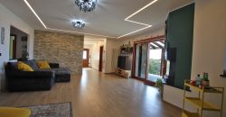 State-of-the-art apartment in a semi-detached villa