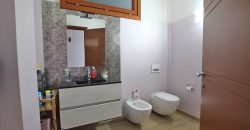 State-of-the-art apartment in a semi-detached villa