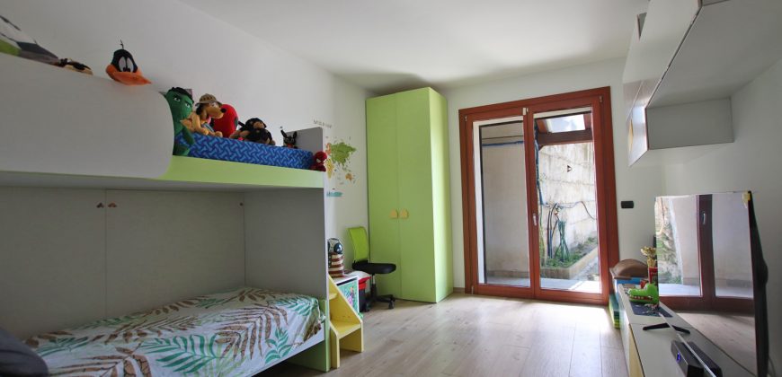 State-of-the-art apartment in a semi-detached villa