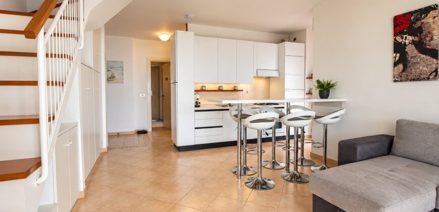 Elegant Top-Floor Duplex Apartment with Stunning Sea Views, Swimming Pool, Tennis Court and Private Garage!